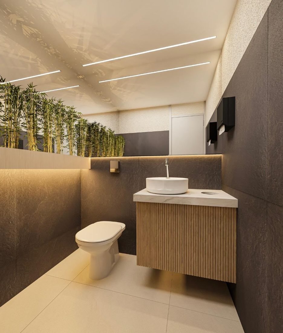 Lavabo com perfis de LED no forro e luz indireta atrás do espelho